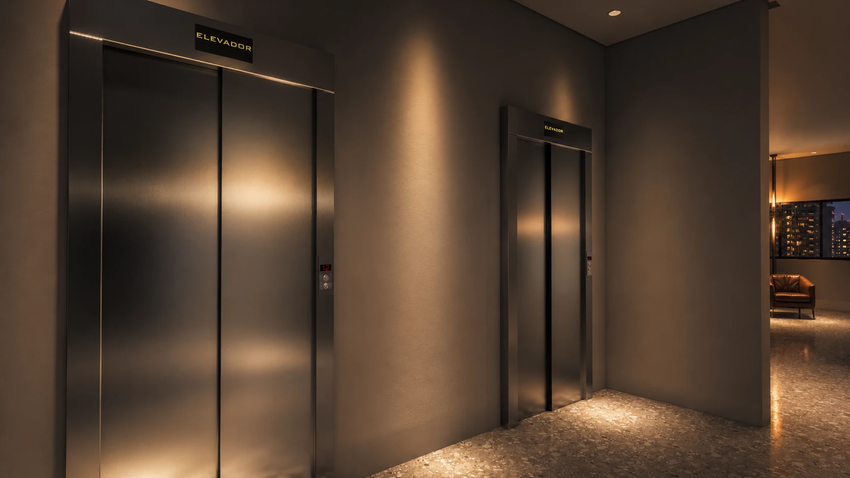 Hall dos elevadores com portas metálicas e luz indireta.