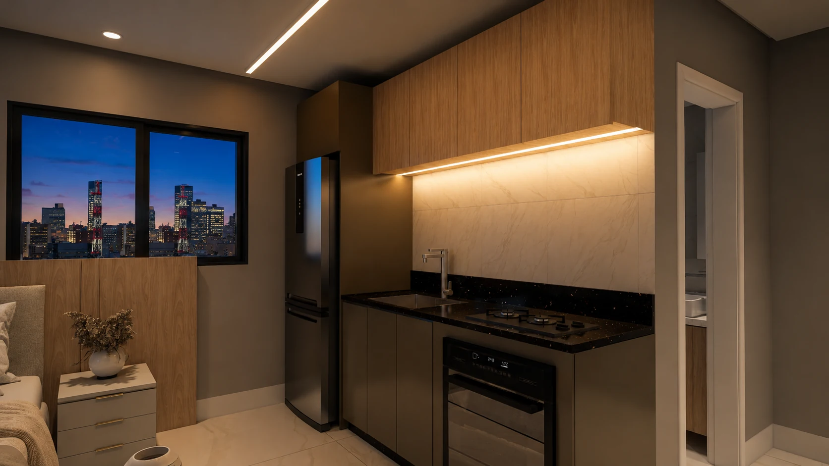 Bancada, cooktop e marcenaria em composição integrada.